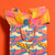 A lifestyle image of a Red Cap Gift Bag, Lobster Fantasy.