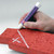 A close image of a Sakura Solid Marker in use on a brick.